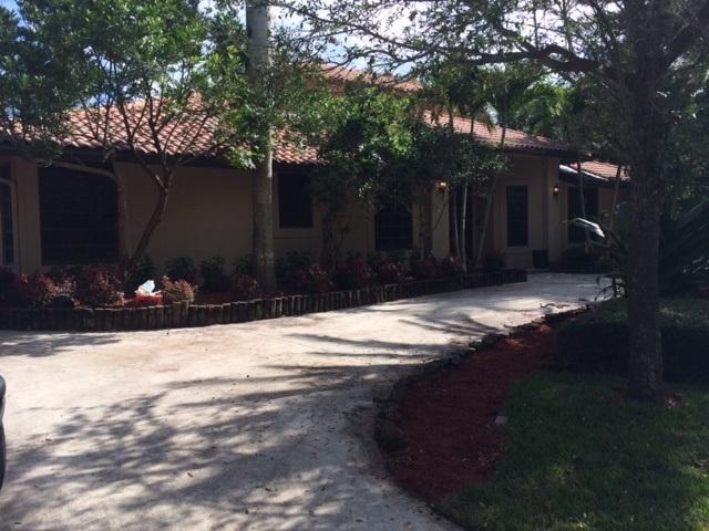 384 Northwest 9th Terrace Boca Raton, FL 33486 - Photo 3 of 16 9th front