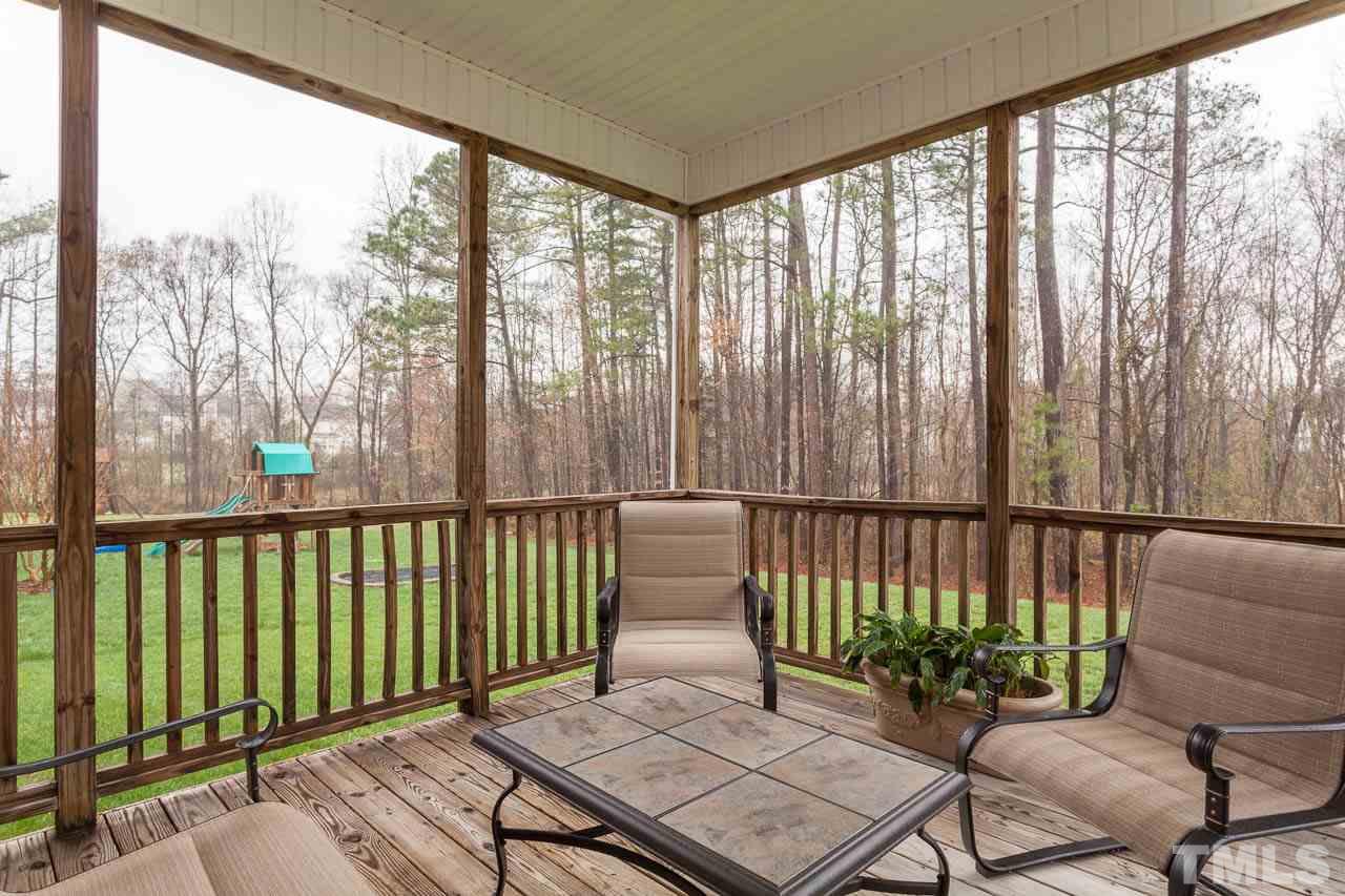 3601 Weir Way Raleigh, NC 27616 - Photo 22 of 25 a balcony with wooden floor