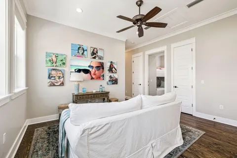 a white bath tub sitting next to a white sink