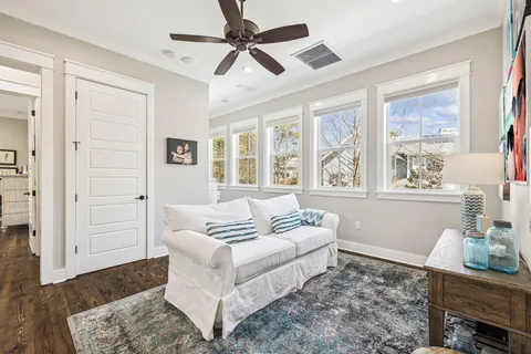 a view of a chairs and table in a balcony