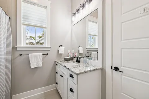 a view of a swimming pool with a lounge chair