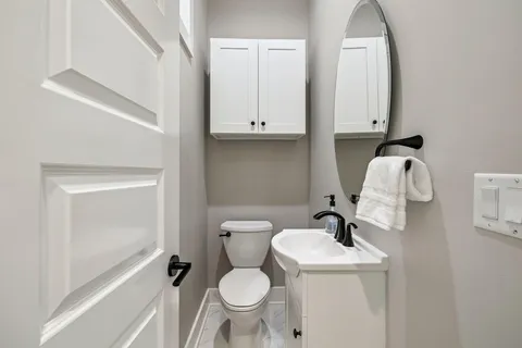 an aerial view of residential house with outdoor space and swimming pool