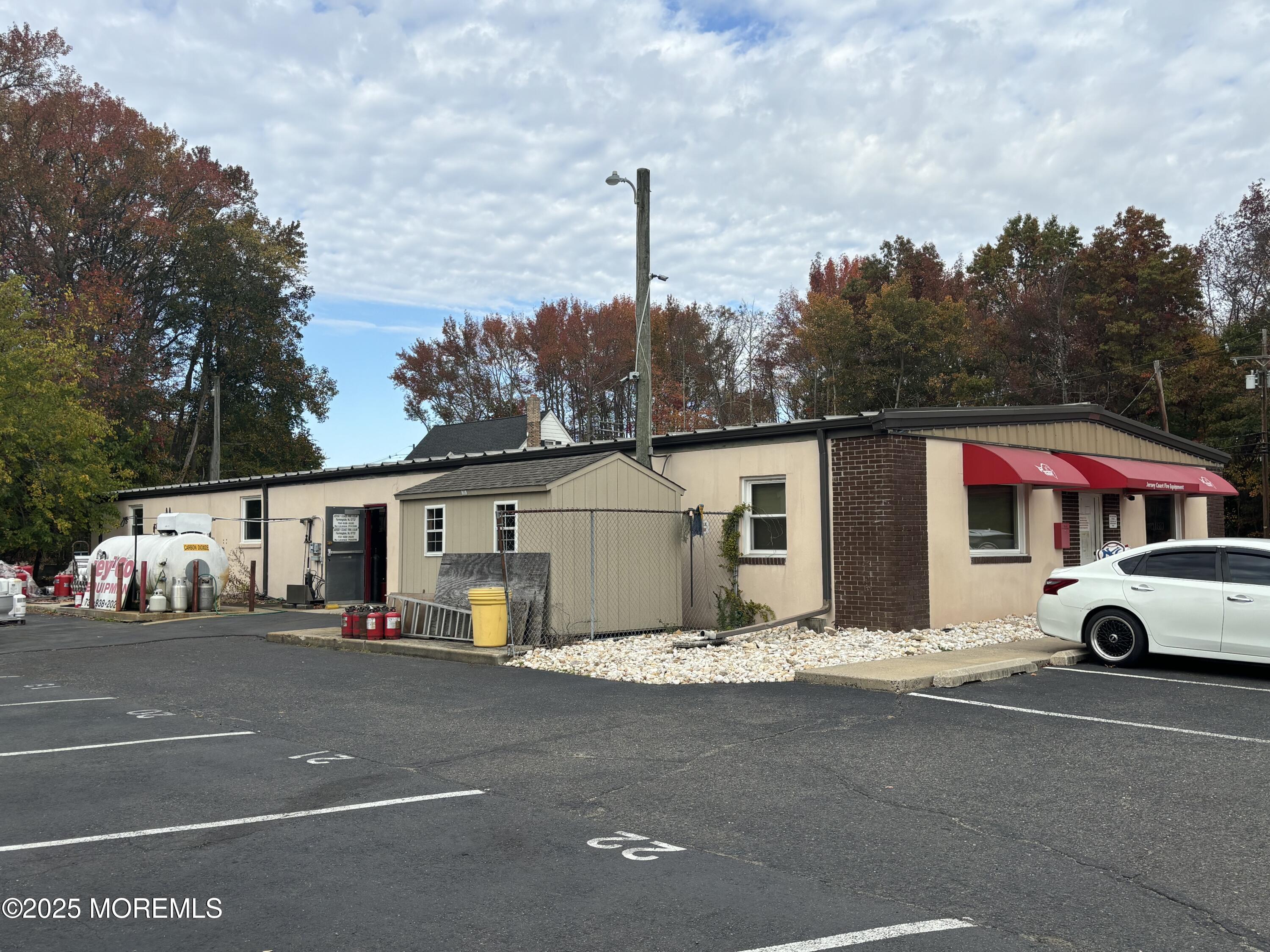 Asbury Road Farmingdale, NJ 07727 - Photo 2 of 9 a view of a street with cars