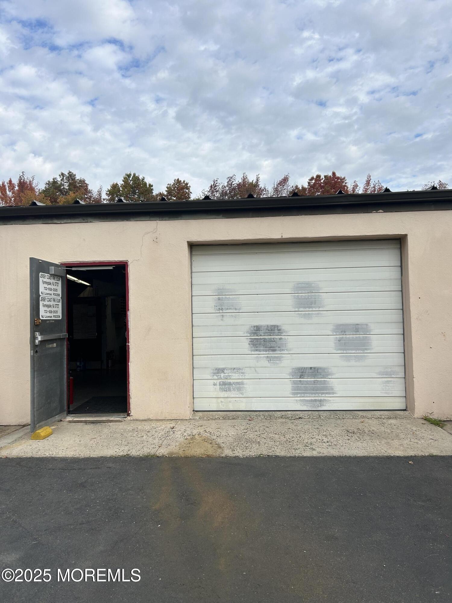 Asbury Road Farmingdale, NJ 07727 - Photo 3 of 9 front view of house with a space