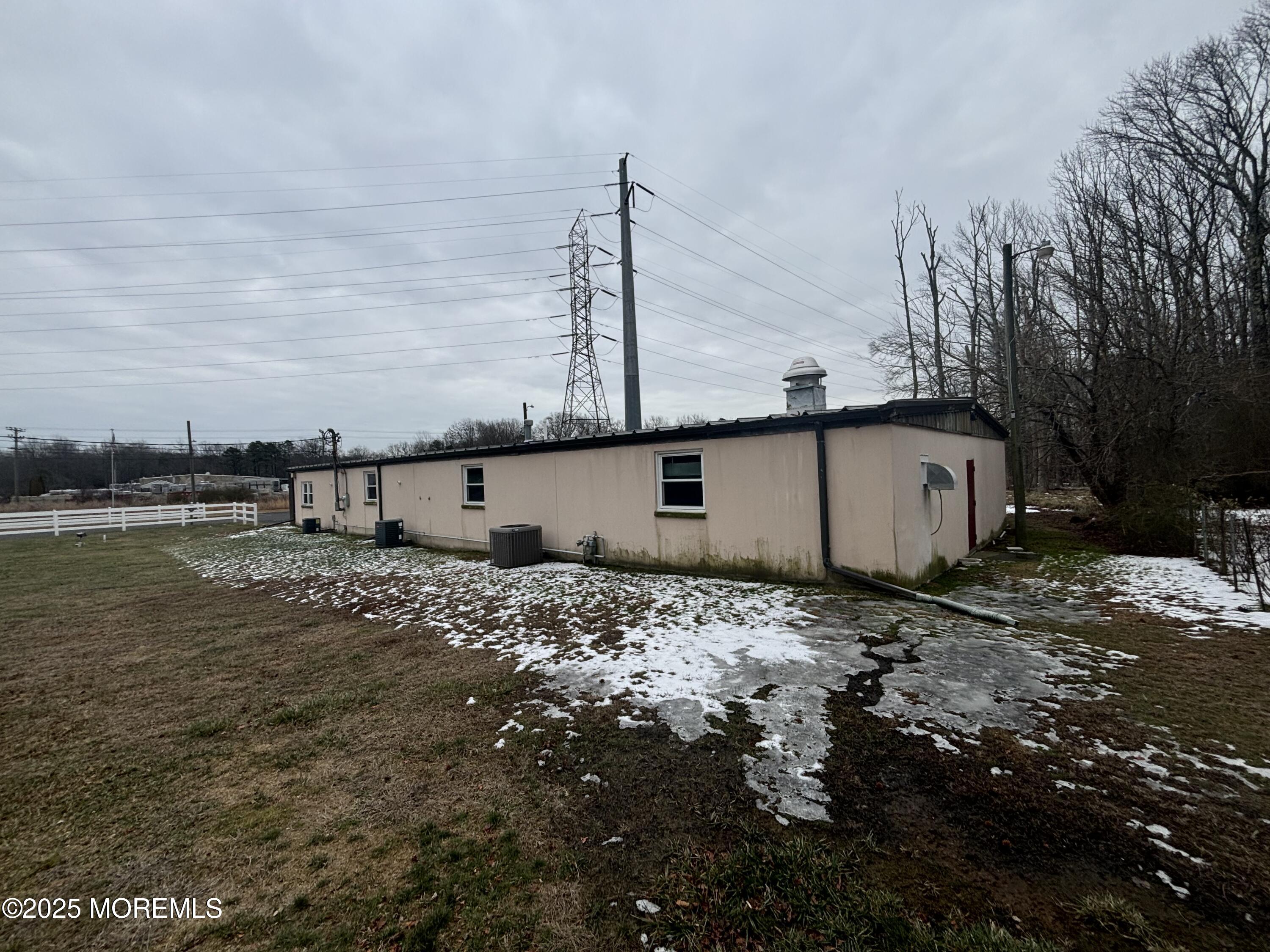 Asbury Road Farmingdale, NJ 07727 - Photo 6 of 9 a view of a large tree in front of a house