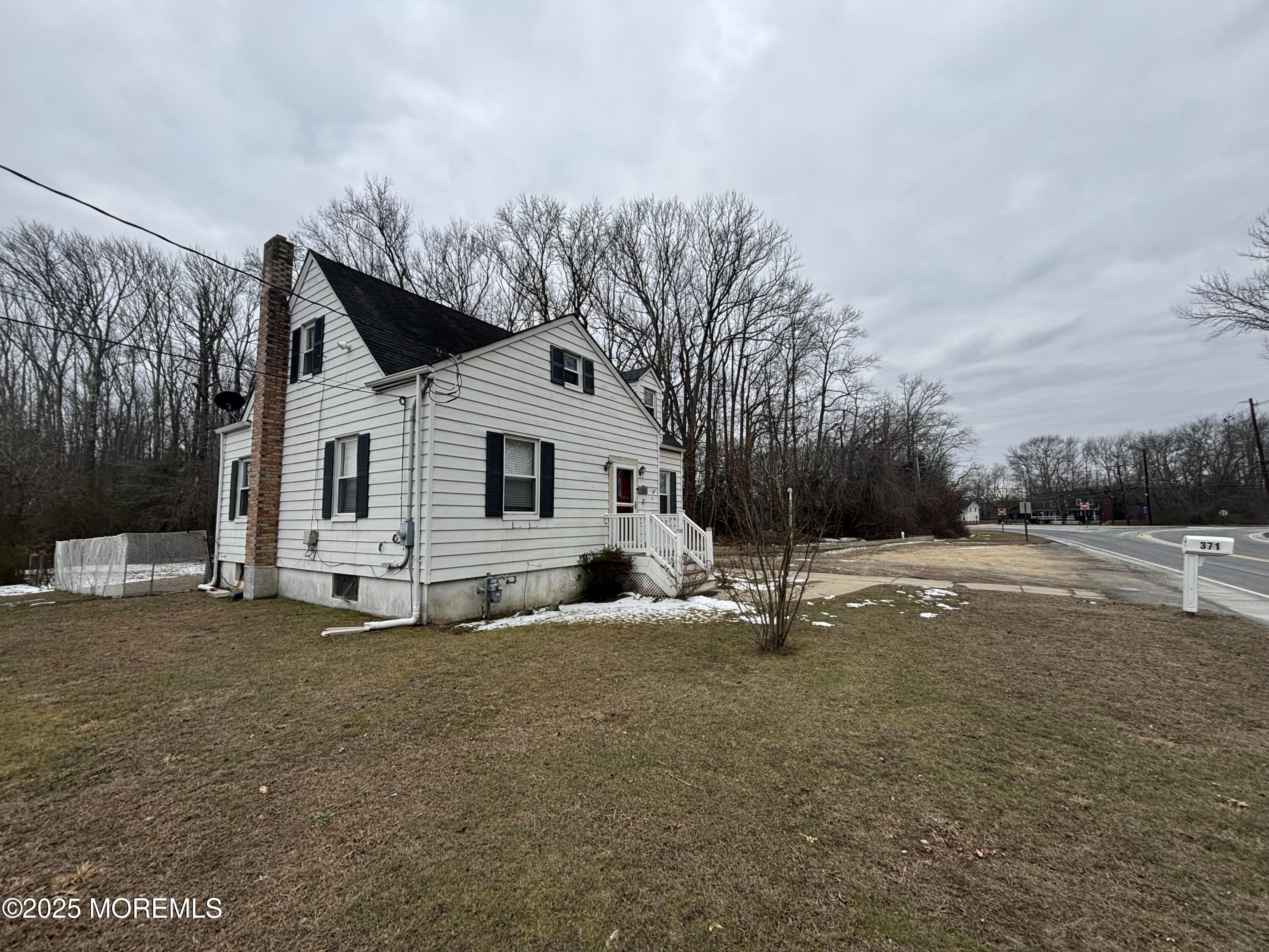 Asbury Road Farmingdale, NJ 07727 - Photo 8 of 9 a view of a house with a yard