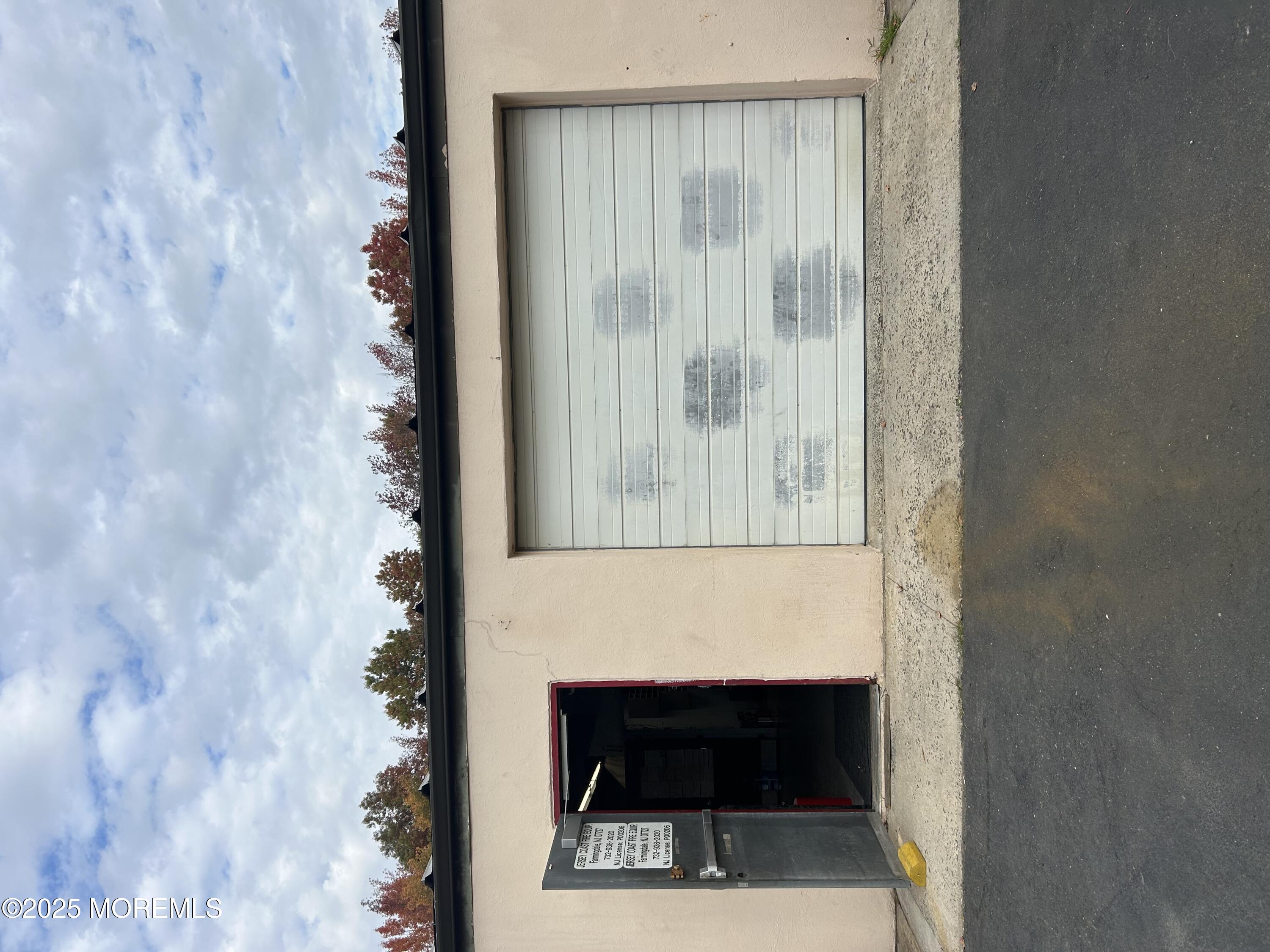 Asbury Road Farmingdale, NJ 07727 - Photo 9 of 9 a closeup of a door with a potted plant