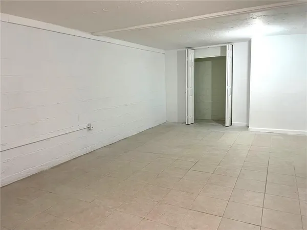 an empty room with an entryway