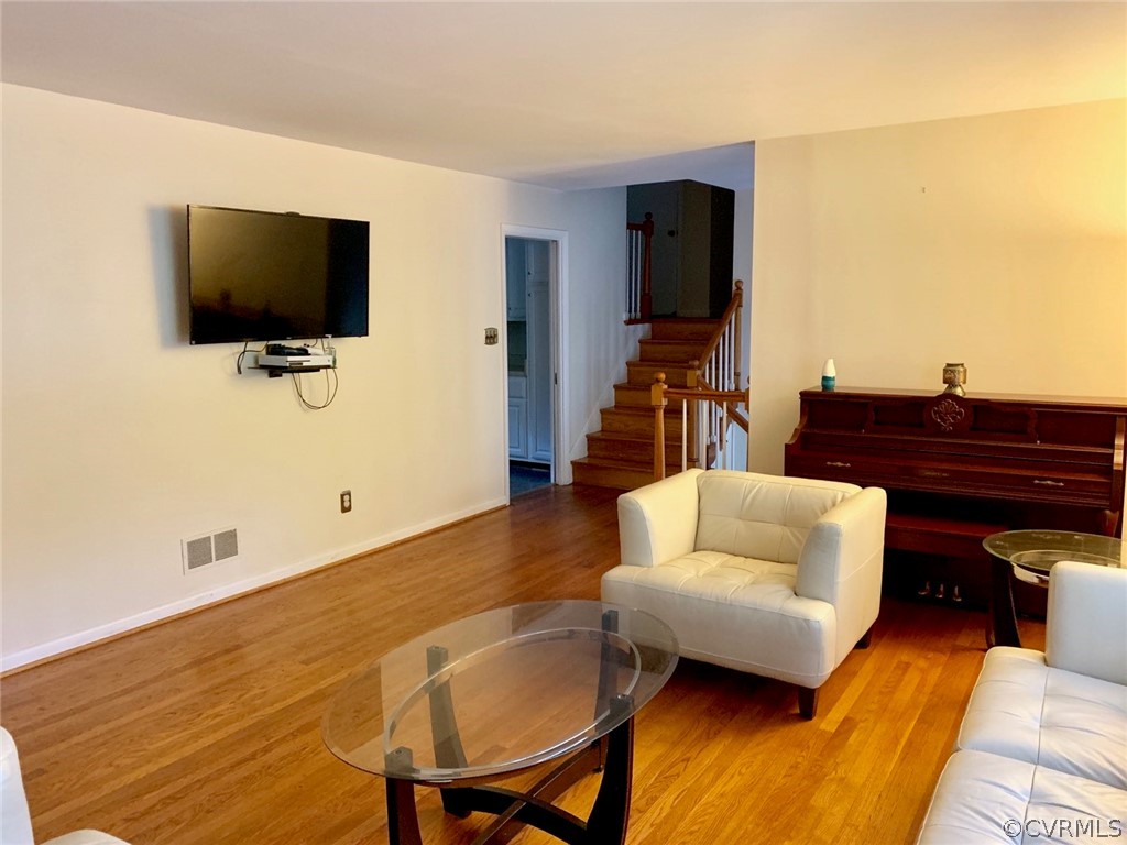 3520 Bittersweet Road Richmond, VA 23235 - Photo 15 of 15 a living room with furniture and a flat screen tv