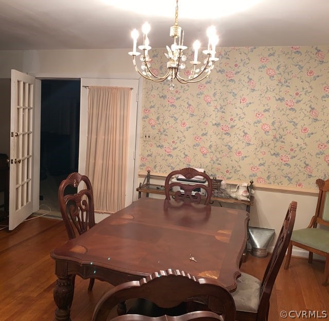 3520 Bittersweet Road Richmond, VA 23235 - Photo 7 of 15 a view of a dining room with furniture and chandelier