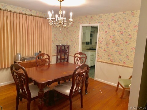 3520 Bittersweet Road Richmond, VA 23235 - Photo 8 of 15 a view of a dining room with furniture and chandelier