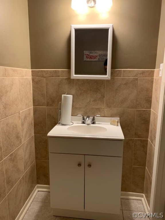3520 Bittersweet Road Richmond, VA 23235 - Photo 10 of 15 a bathroom with a sink and mirror