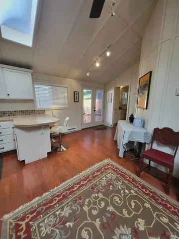 a living room with furniture and a couch