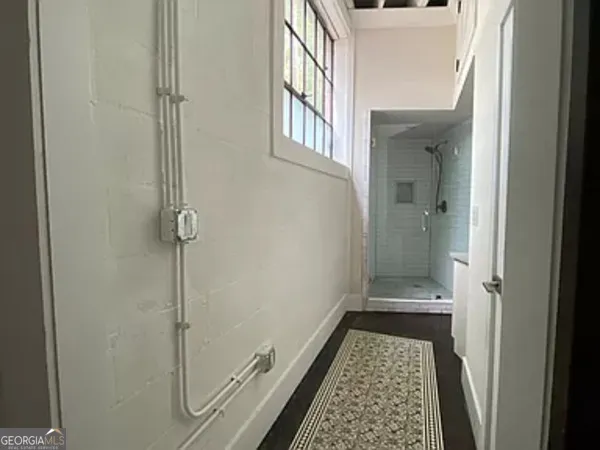 a bathroom with a sink and a shower