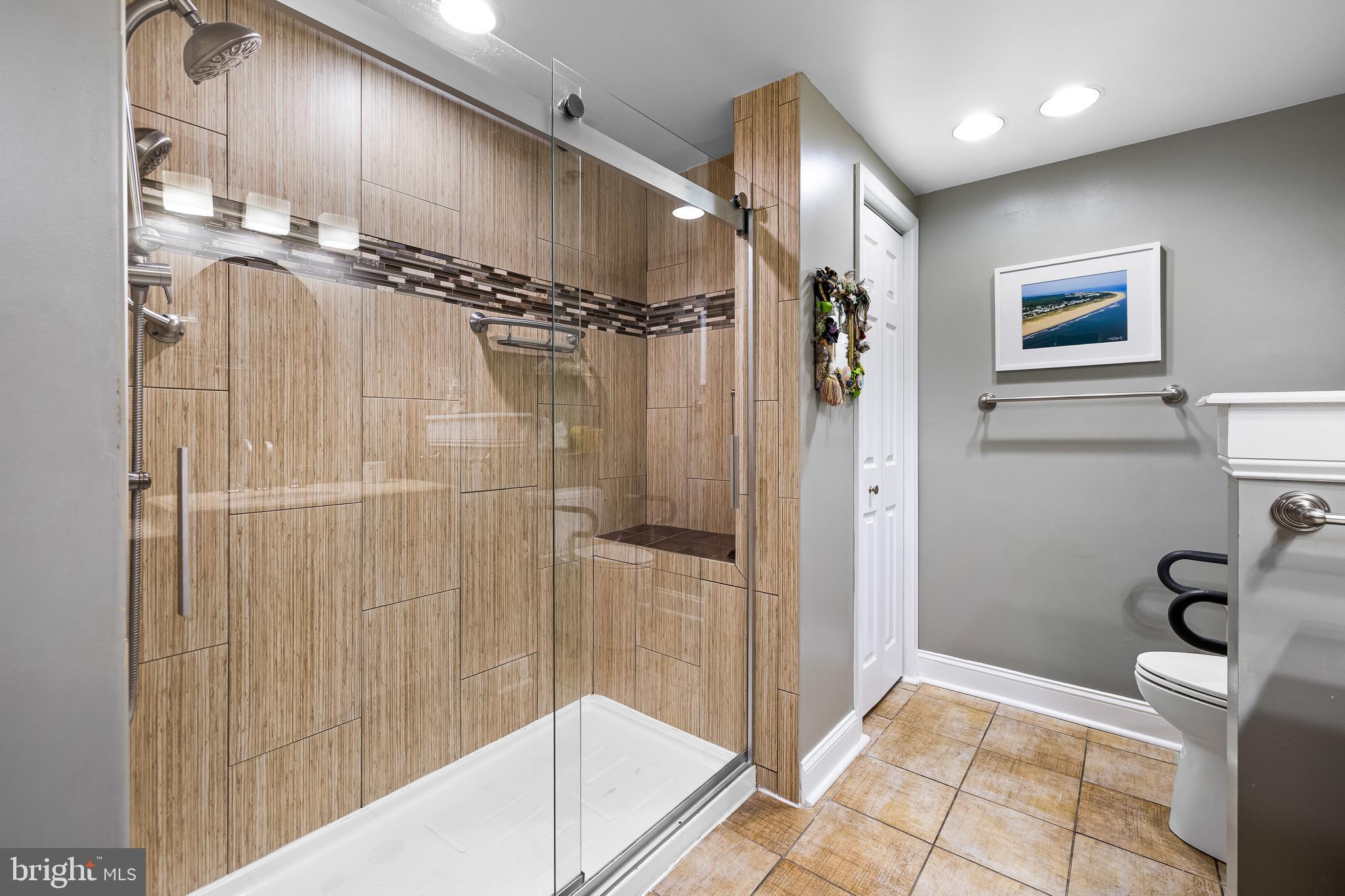 2331 Old Court Road, Unit 307 Baltimore, MD 21208 - Photo 26 of 54 a bathroom with a shower and a tub