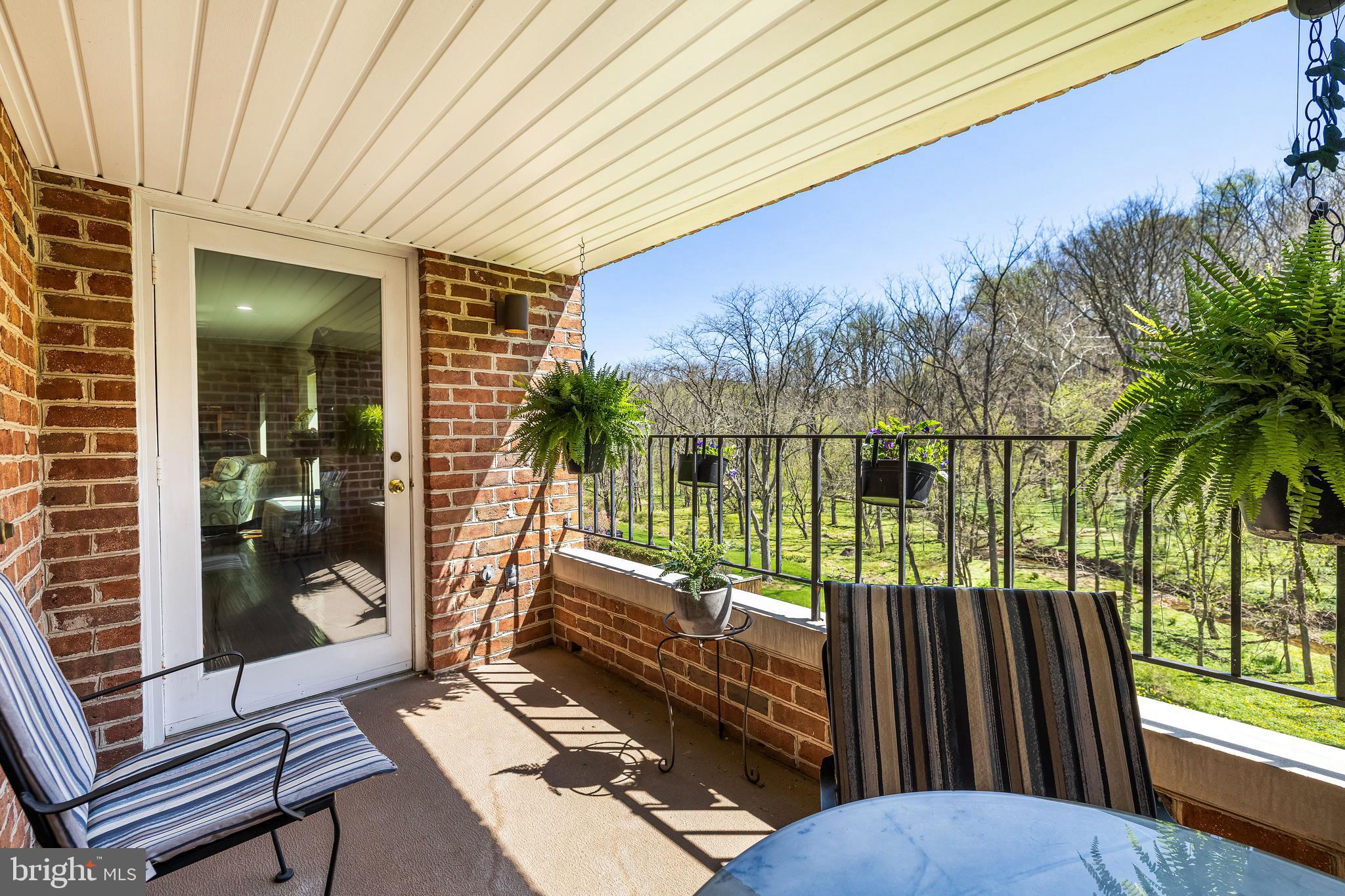 2331 Old Court Road, Unit 307 Baltimore, MD 21208 - Photo 35 of 54 a view of a balcony with chairs