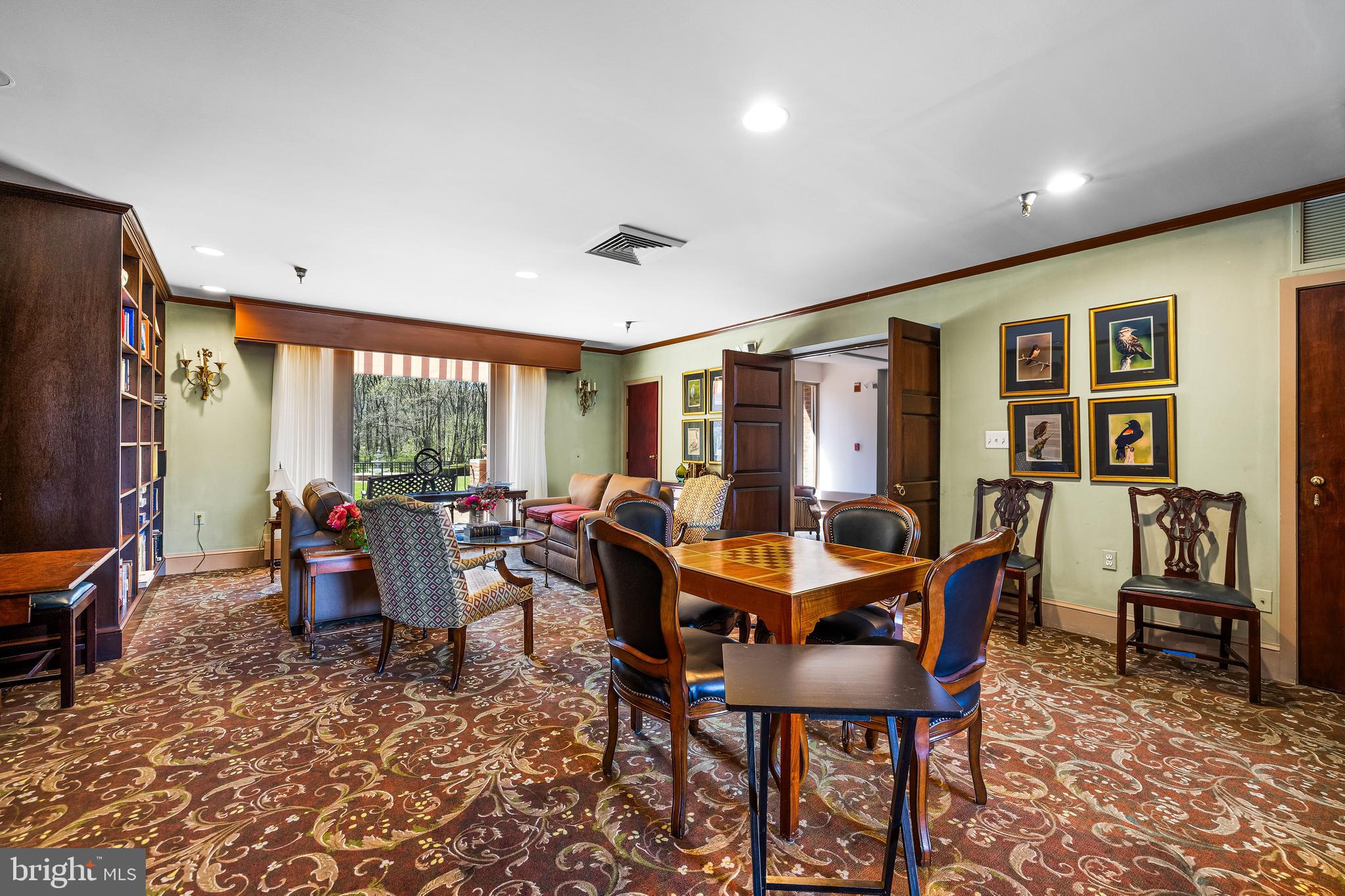 2331 Old Court Road, Unit 307 Baltimore, MD 21208 - Photo 41 of 54 a dining room with furniture window and wooden floor