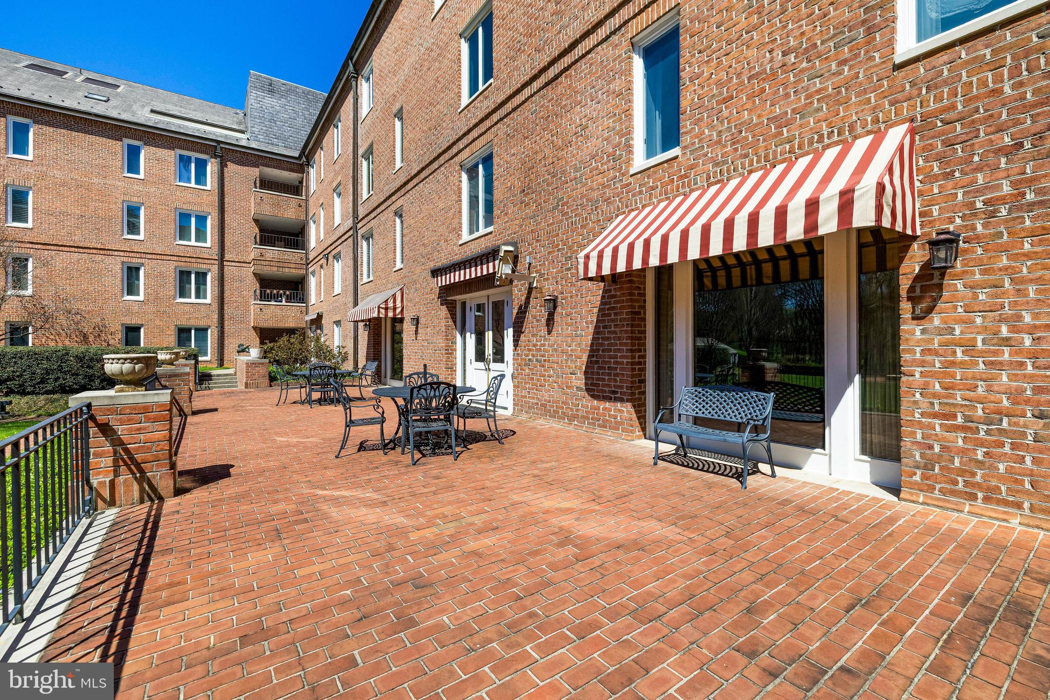 2331 Old Court Road, Unit 307 Baltimore, MD 21208 - Photo 47 of 54 a view of a building with sitting area and furniture