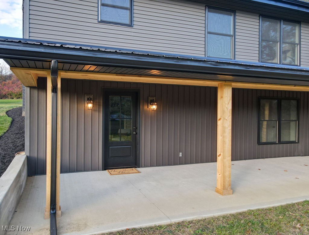 1048 Rolling Meadows Road Akron, OH 44333 - Photo 3 of 41 Lower level patio/entry
