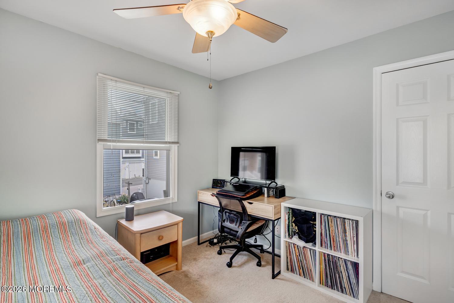 19 Shore Way Lavallette, NJ 08735 - Photo 18 of 38 a workspace with wooden floor and a chandelier