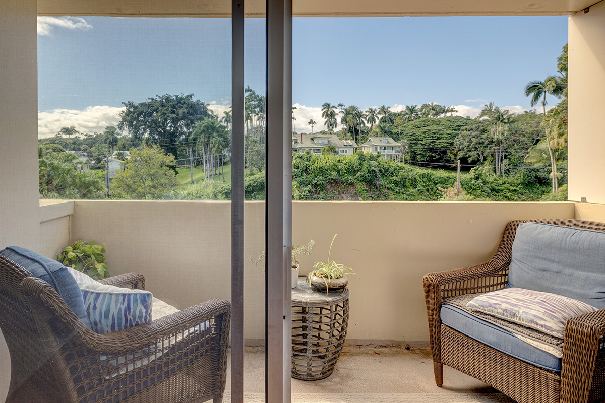 84 Pukihae Street, Unit 406 Hilo, HI 96720 - Photo 7 of 26 a view of a balcony with chair and potted plant