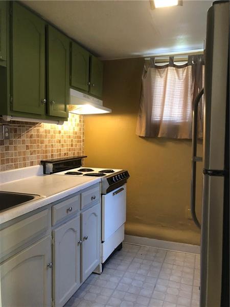 10208 Pearl Road Pittsburgh, PA 15235 - Photo 21 of 23 Lower level 2nd kitchen. Perfect in law, teenager suite.