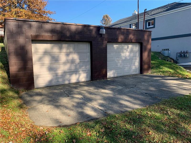 10208 Pearl Road Pittsburgh, PA 15235 - Photo 22 of 23 Oversized 2 car detached garage being sold in it's absolute "as is" condition as the rear wall is bowed.