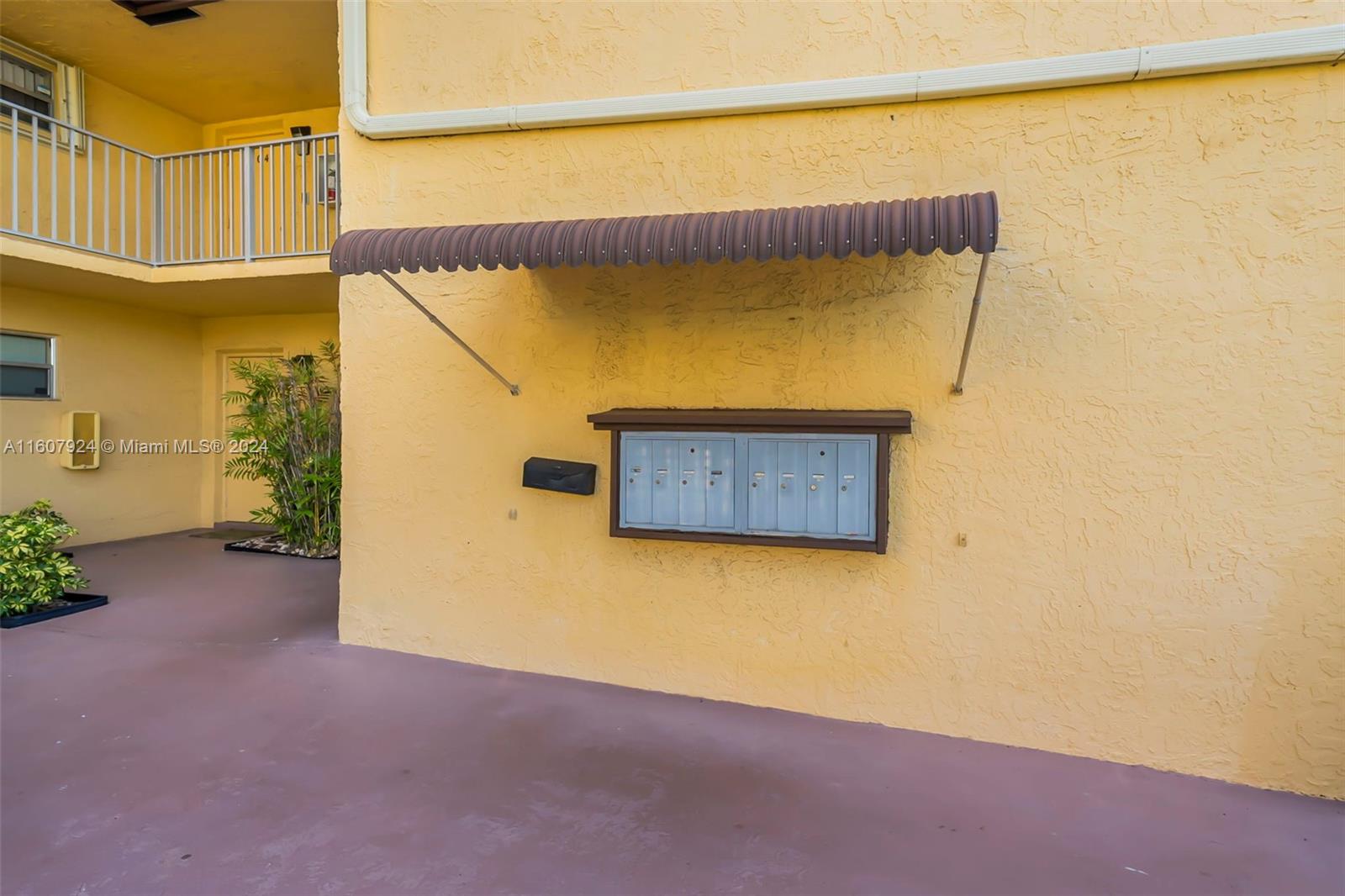 8780 Azalea Court, Unit 104 Tamarac, FL 33321 - Photo 24 of 37 a view of a garage