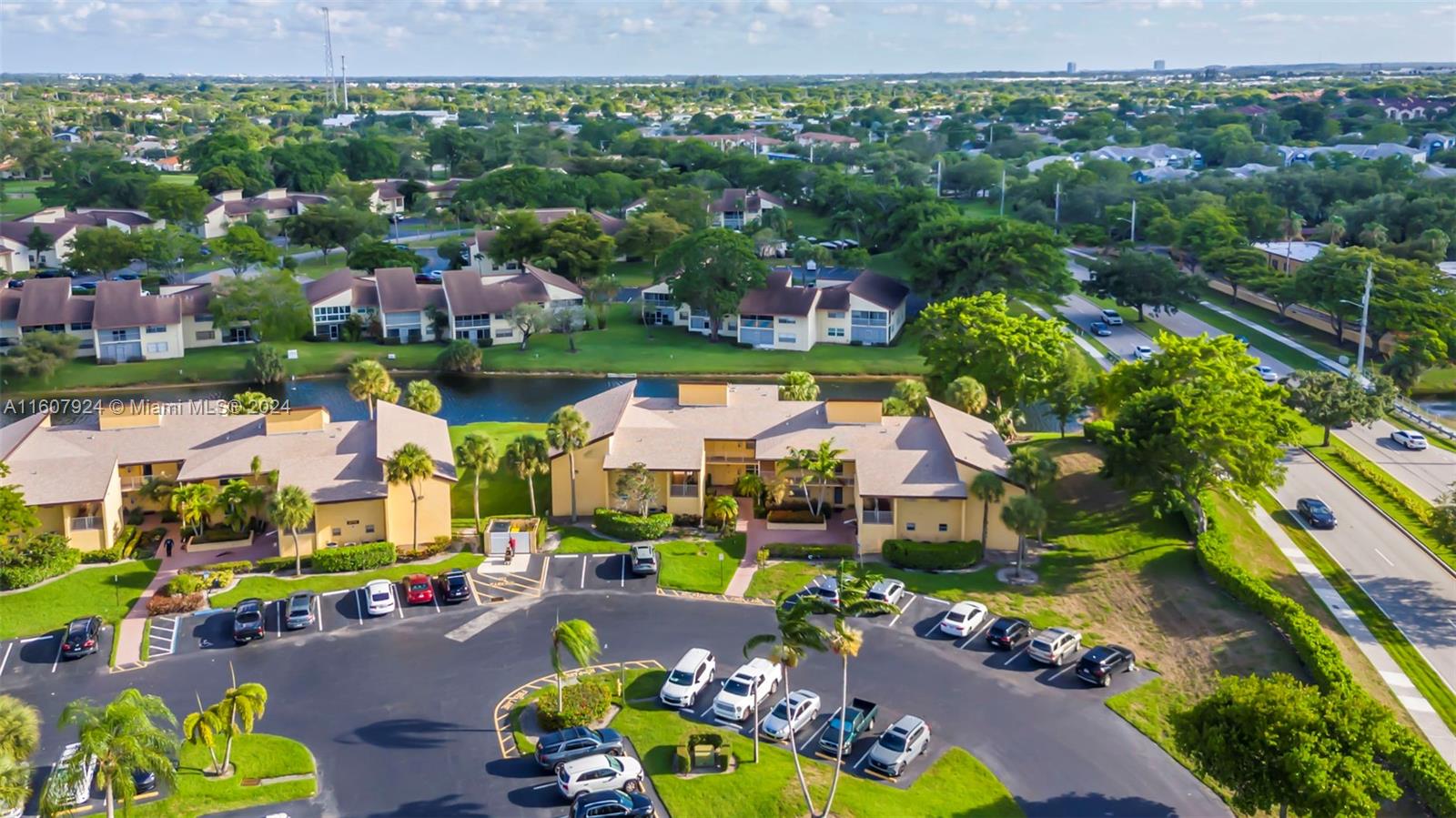 8780 Azalea Court, Unit 104 Tamarac, FL 33321 - Photo 26 of 37 an aerial view of a houses with swimming pool and outdoor seating
