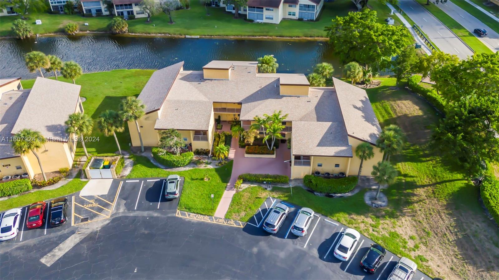 8780 Azalea Court, Unit 104 Tamarac, FL 33321 - Photo 27 of 37 an aerial view of a house with a yard basket ball court and outdoor seating