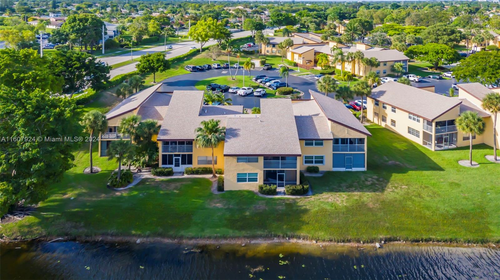8780 Azalea Court, Unit 104 Tamarac, FL 33321 - Photo 28 of 37 an aerial view of a house with a yard basket ball court and outdoor seating