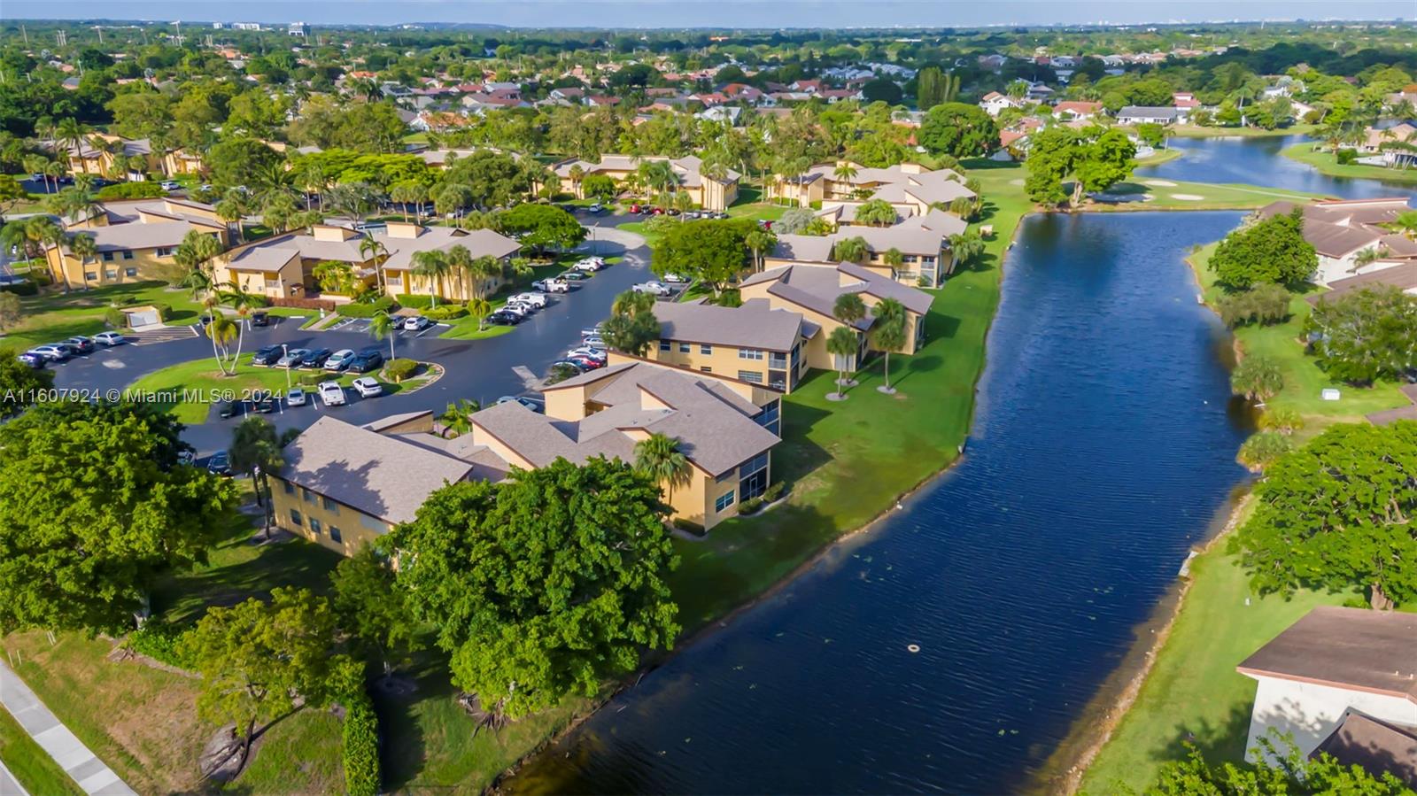 8780 Azalea Court, Unit 104 Tamarac, FL 33321 - Photo 3 of 37 an aerial view of residential houses with outdoor space