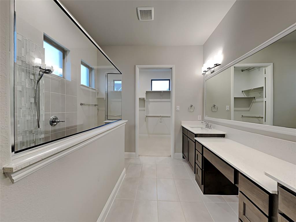 8262 Ottowa Ridge Frisco, TX 75034 - Photo 8 of 24 a large kitchen with a stove a sink dishwasher and a refrigerator