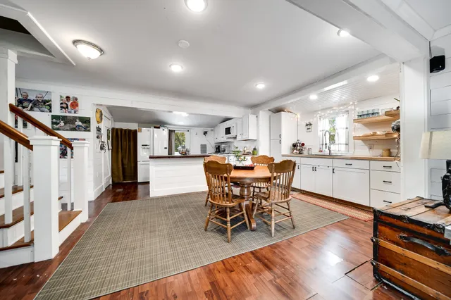 a view of a living room with entryway