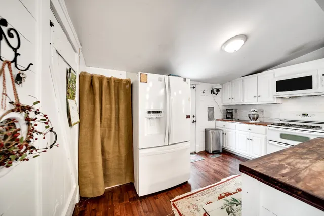 a view of a yard with an outdoor space