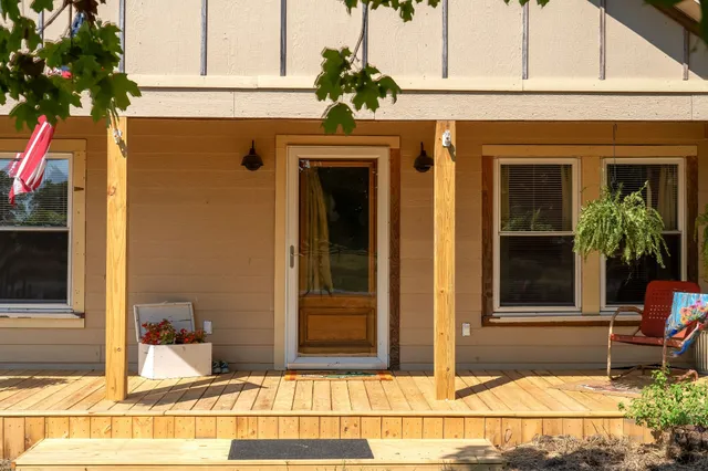a front view of a house with garden