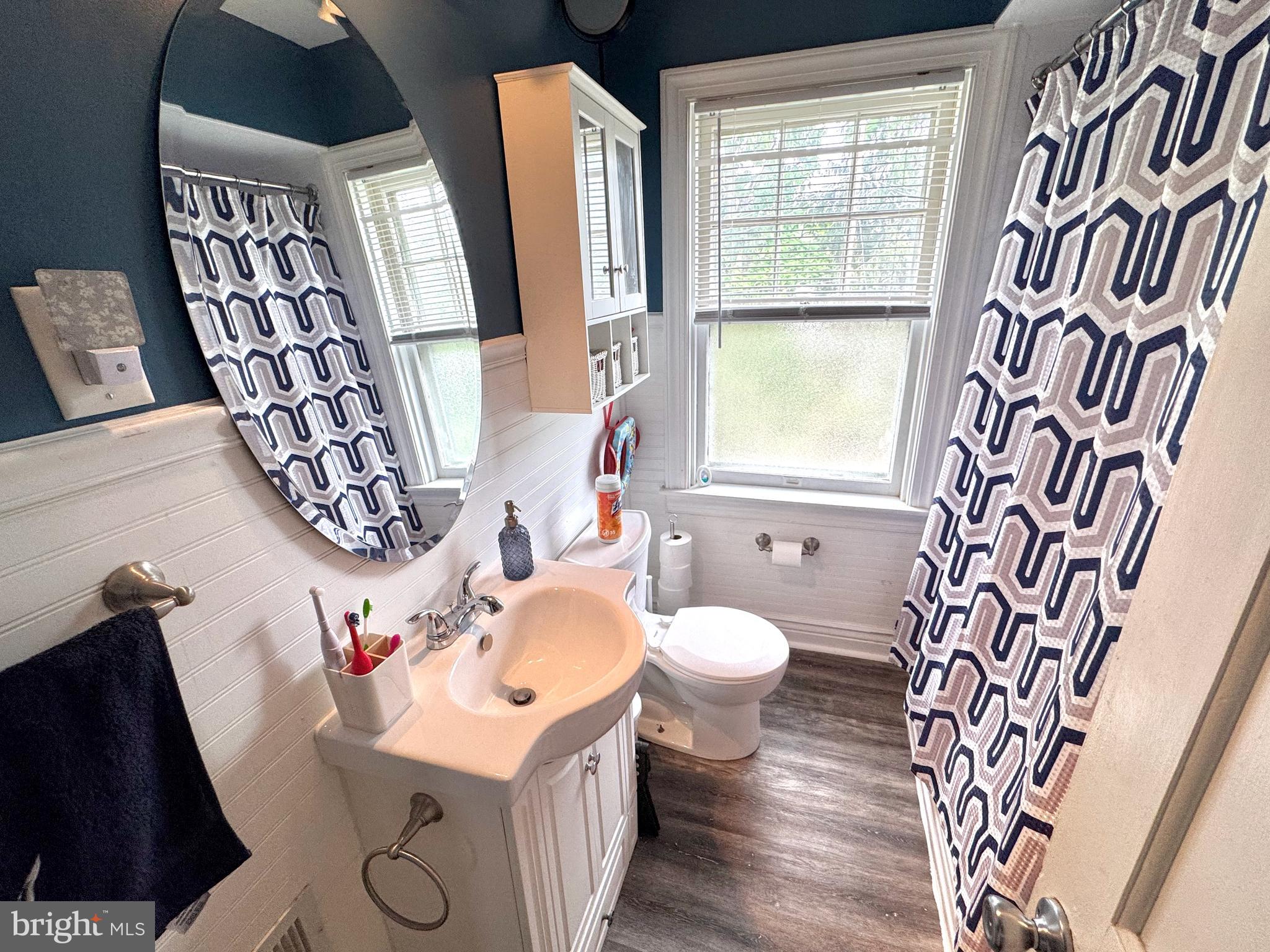 2545 Grant Street Reading, PA 19606 - Photo 14 of 25 a bathroom with a sink and a mirror