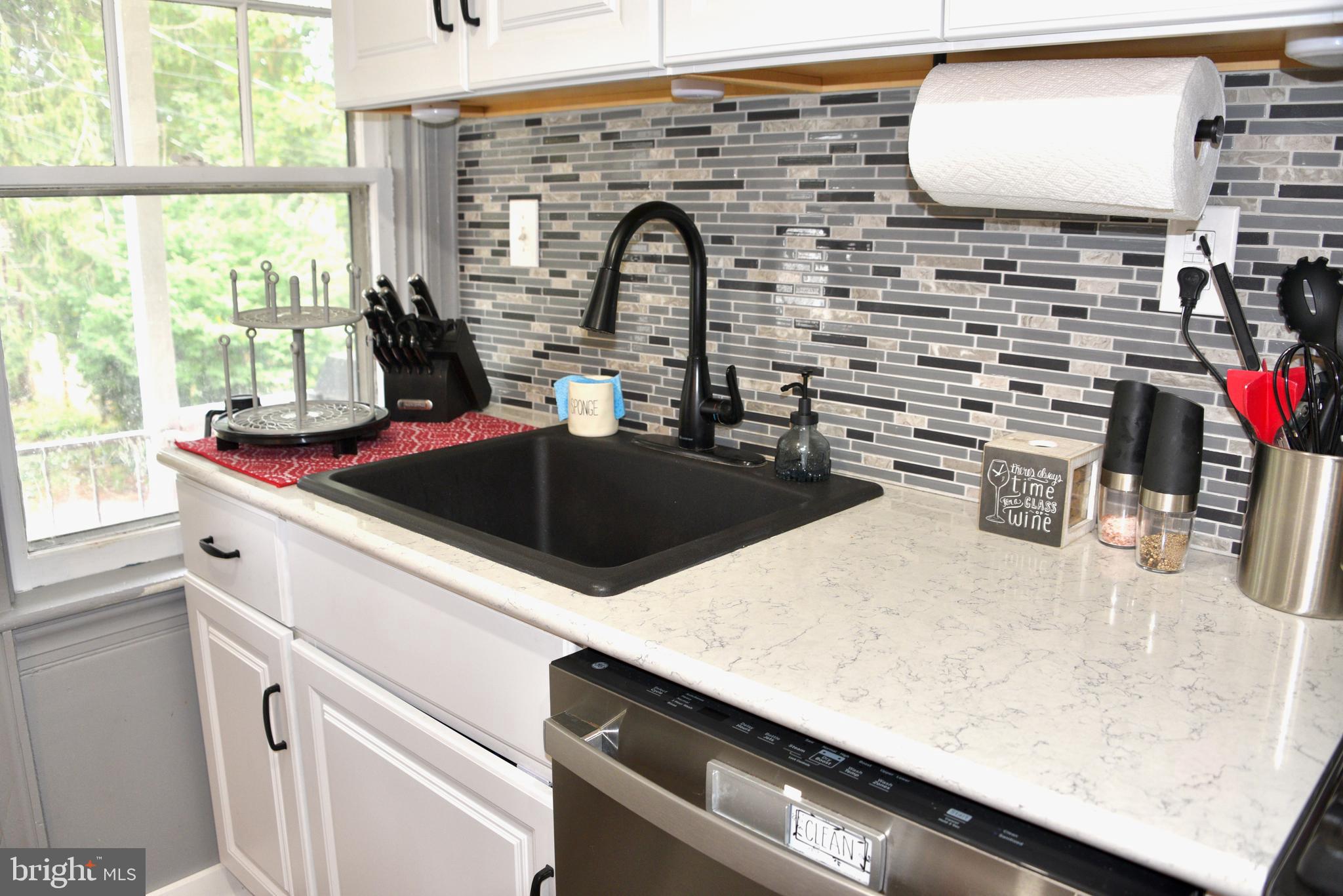 2545 Grant Street Reading, PA 19606 - Photo 9 of 25 a kitchen with a sink and a stove