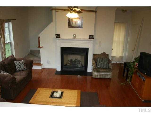 310 Burrell Road Durham, NC 27703 - Photo 6 of 21 Beautiful gas log fireplace accents the family room. Touch of the button warmth. Den/Family/Great Room
