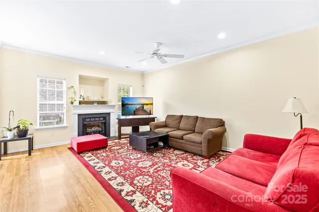 a kitchen with stainless steel appliances granite countertop a sink and a wooden cabinets