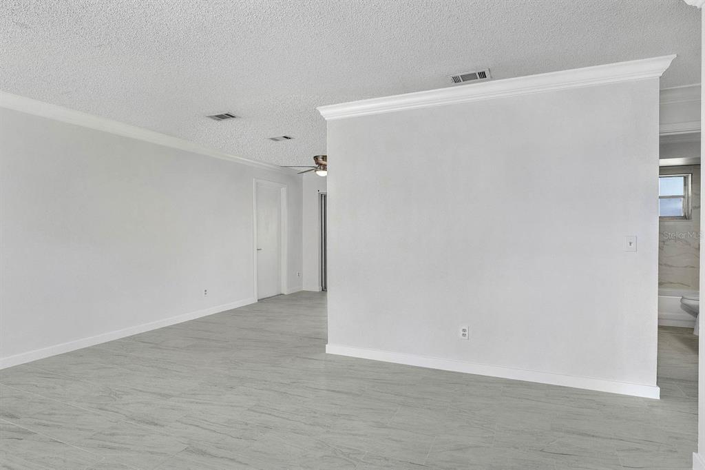6449 Eve Street St. Cloud, FL 34771 - Photo 11 of 25 a view of an empty room