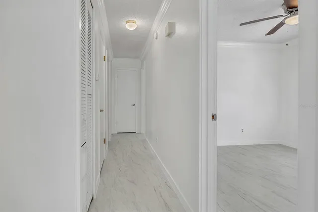 a view of a bathroom from a hallway