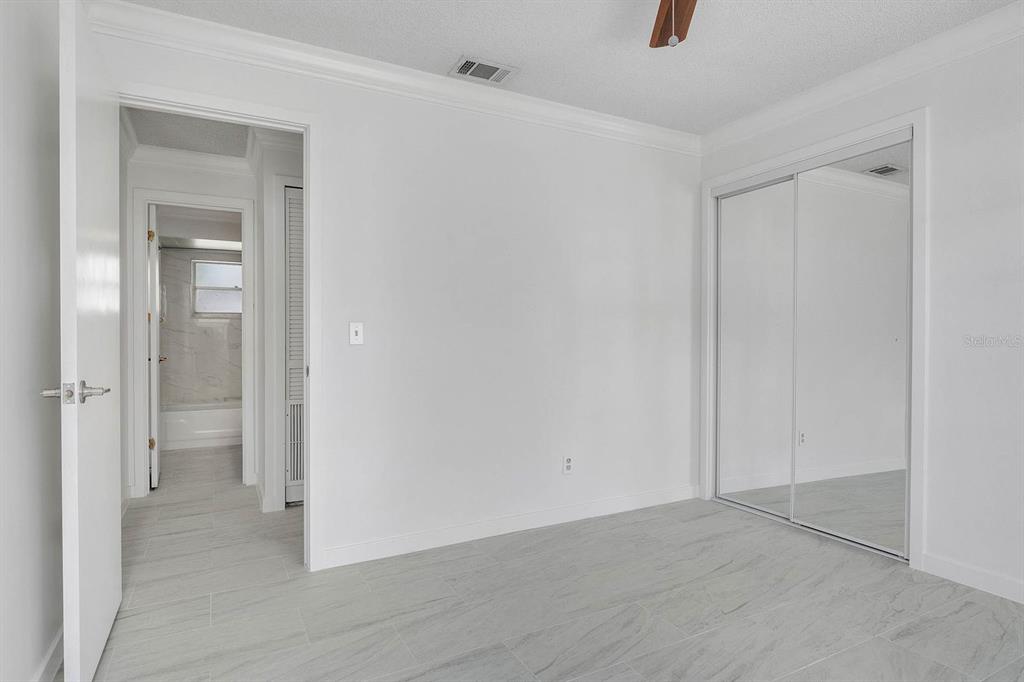 6449 Eve Street St. Cloud, FL 34771 - Photo 14 of 25 a view of an empty room