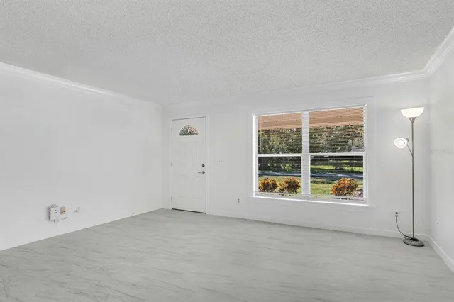 an empty room with window