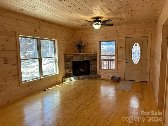 a view of livingroom with hardwood floor and a ceiling fan