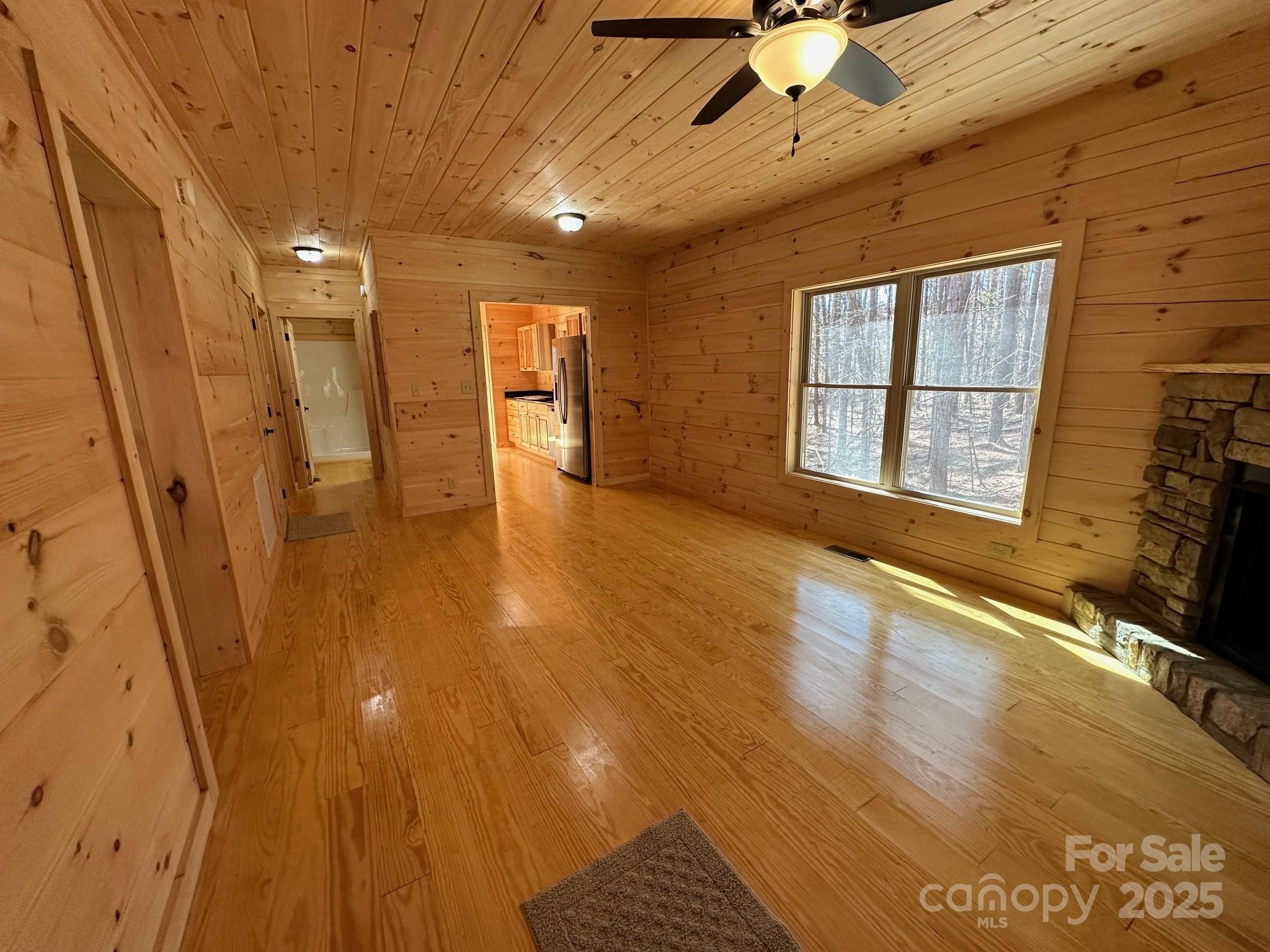 132 Chasewood Drive Rutherfordton, NC 28139 - Photo 16 of 40 a view of livingroom with hardwood floor and a ceiling fan