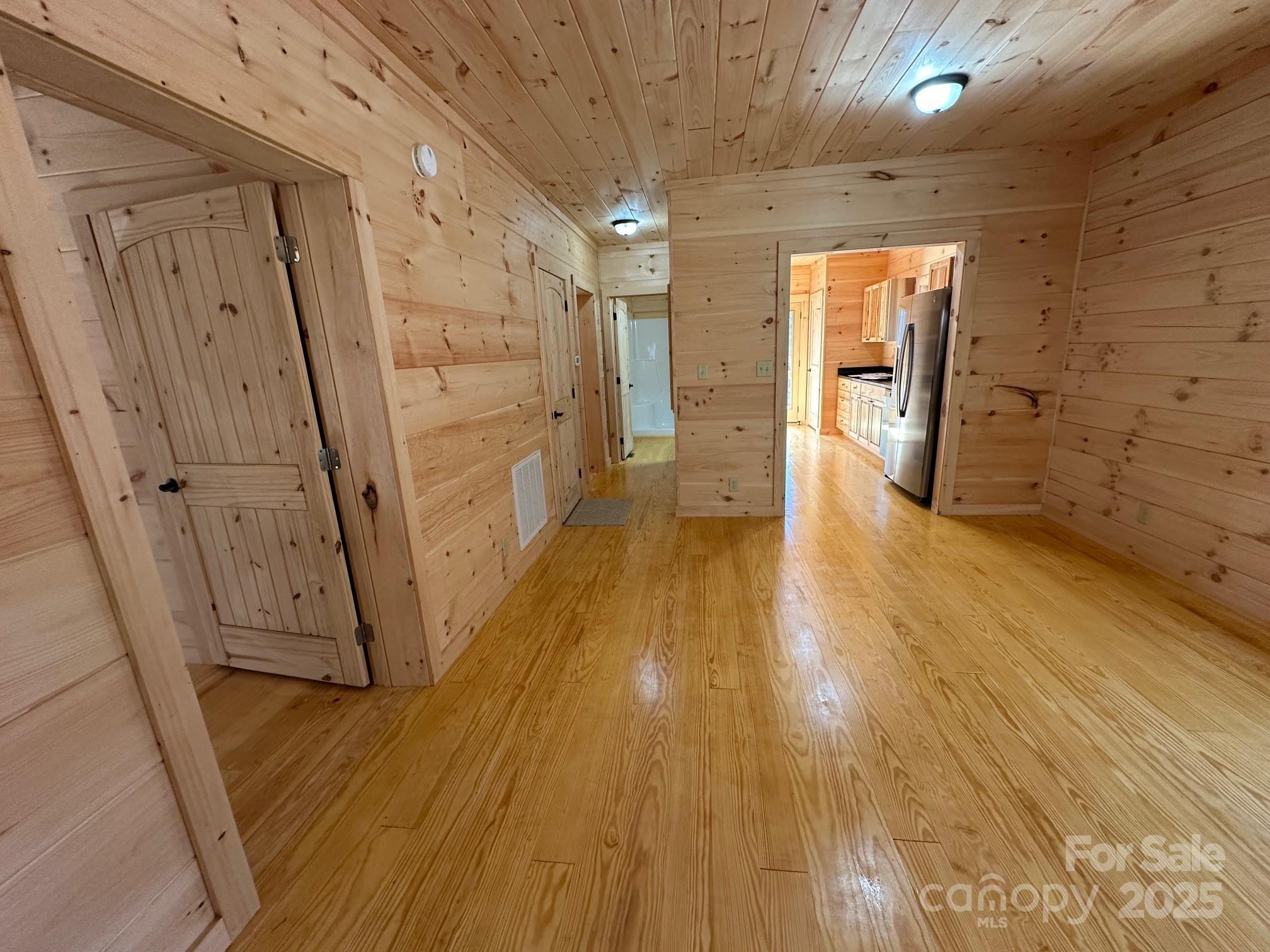 132 Chasewood Drive Rutherfordton, NC 28139 - Photo 19 of 40 a view of a hallway with wooden floor