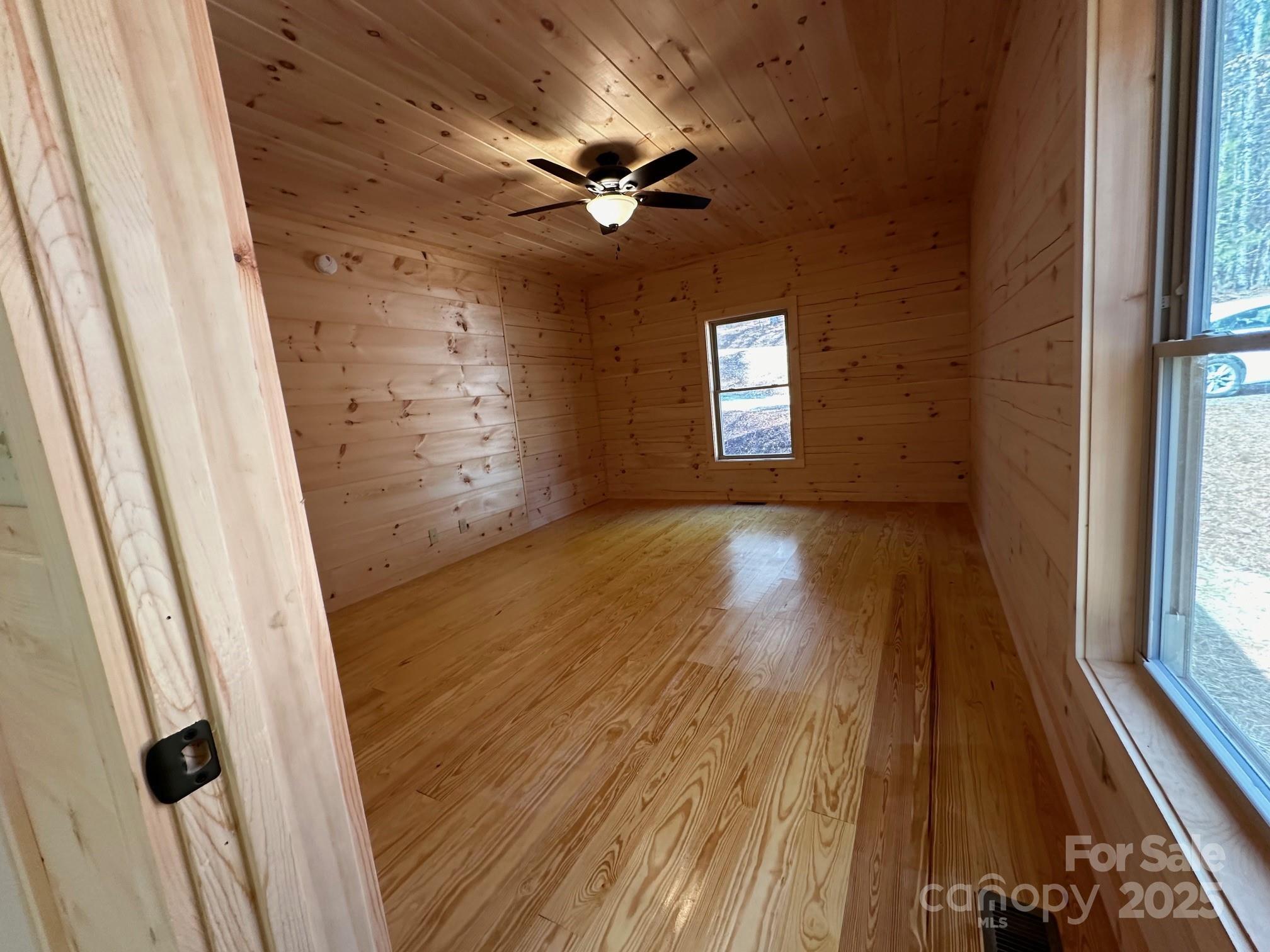 132 Chasewood Drive Rutherfordton, NC 28139 - Photo 27 of 40 wooden floor in an empty room with a window