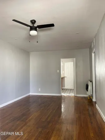 a view of a livingroom with wooden floor