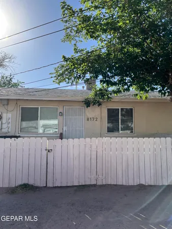 a view of a house with a garage